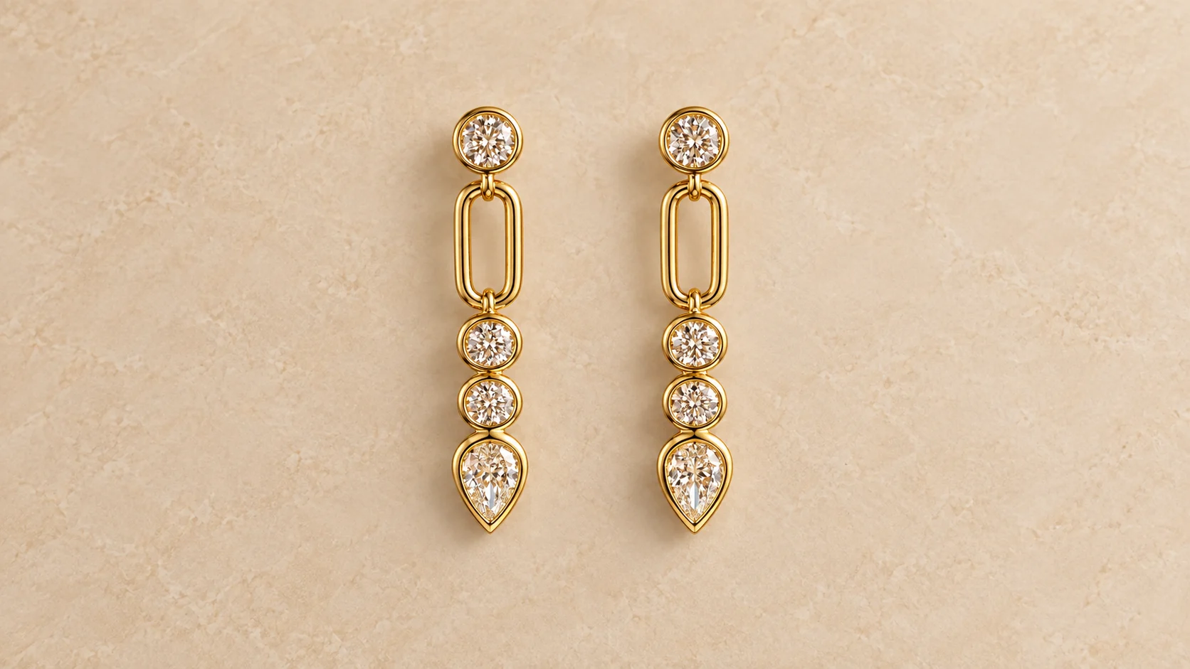 Bezel-set diamond link drop earrings in 18k yellow gold on sand-coloured stone